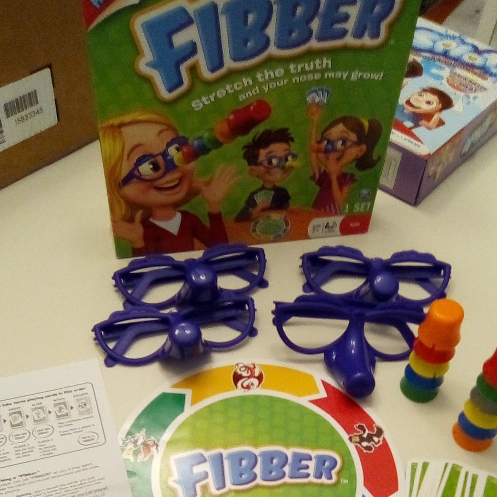 Spin Master Fibber game Ages 7+ Family game Tutoring Therapy reinforcer